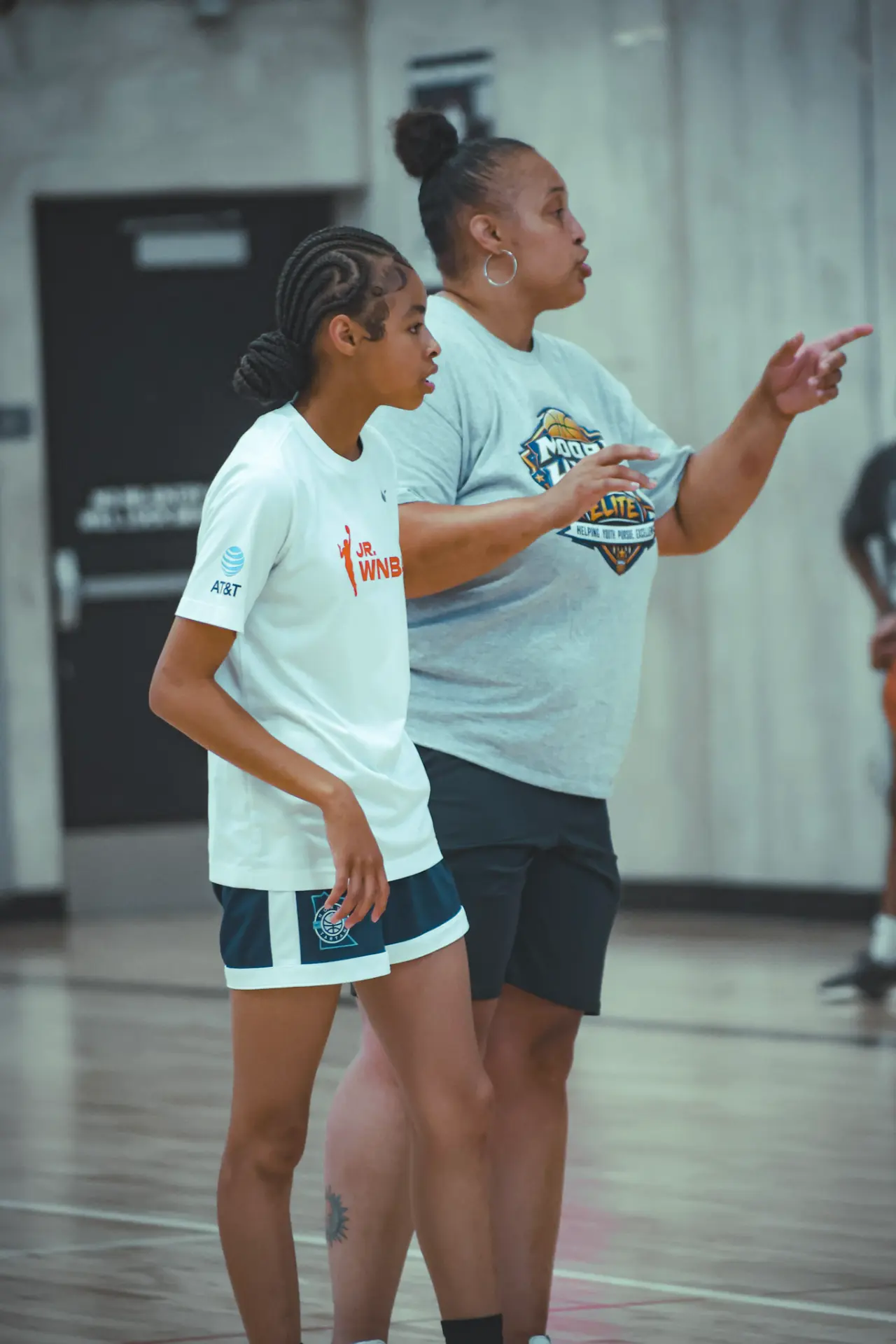 Coach Tamara Moore directing a player during Moore H.Y.P.E. tryouts