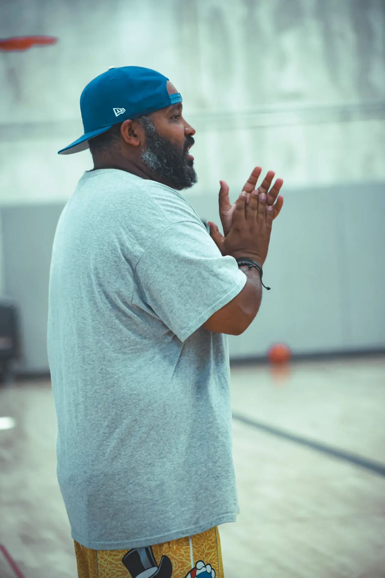 Moore H.Y.P.E. coach encouraging athletes from the sideline